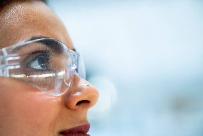 portrait of a female scientist with protective glasses F100030111 e1661111103196