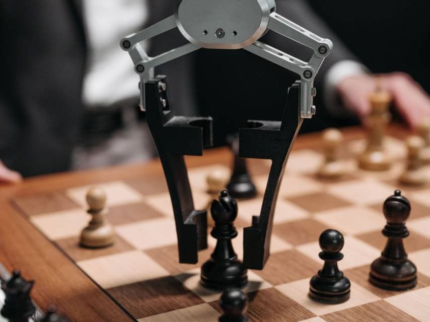 artificial intelligence robot playing chess with a human F100030764 1 01